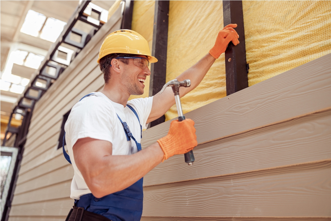 joyful male builder using hammer at construction s 2021 12 09 11 29 40 utc