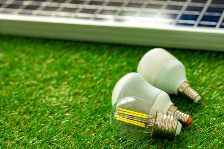 solar energy panel and light bulb, green energy