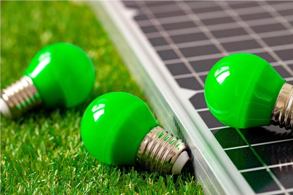solar energy panel and light bulb, green energy