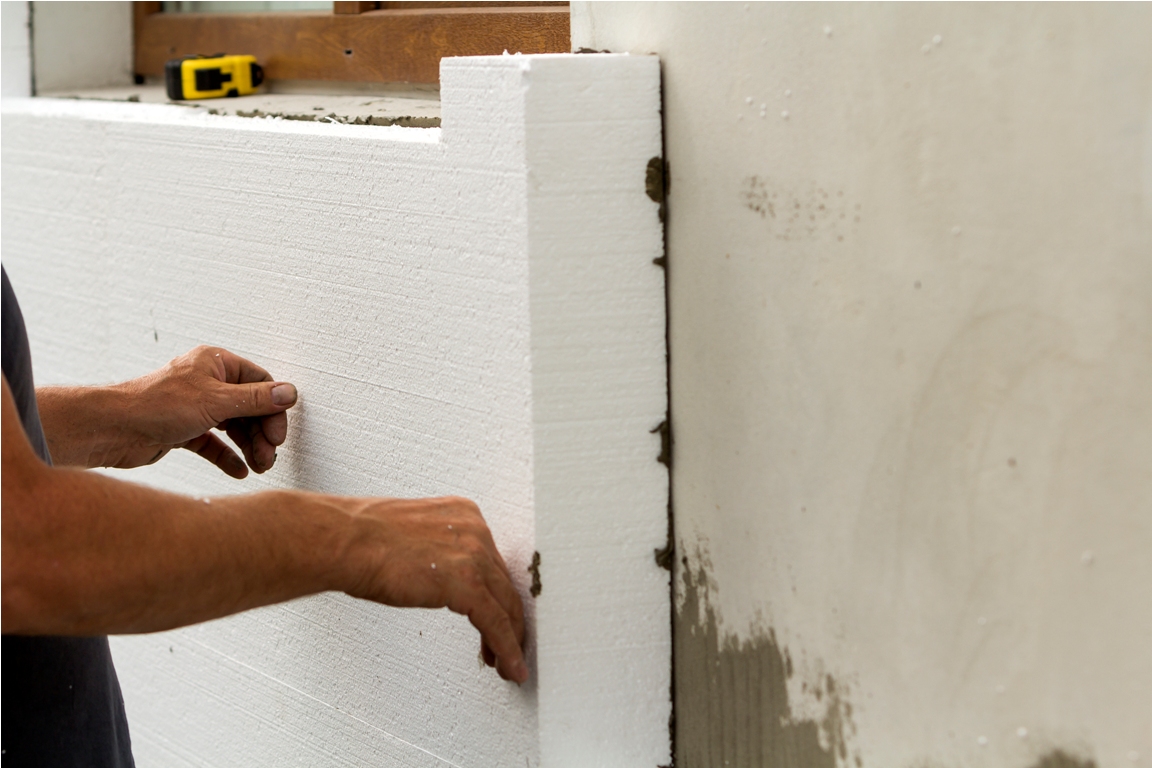 worker hands installing white rigid polyurethane f 2022 02 12 00 24 48 utc