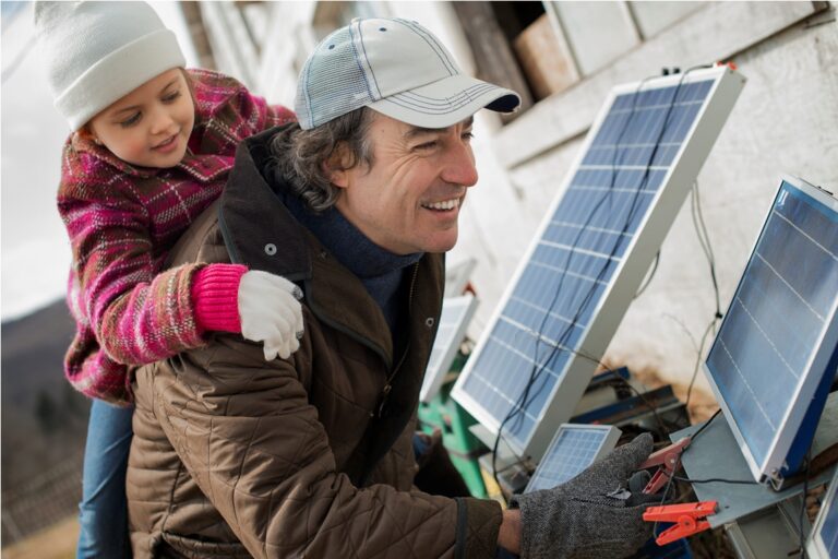 a man giving a child a piggybank while trying to c 2022 03 04 02 32 09 utc