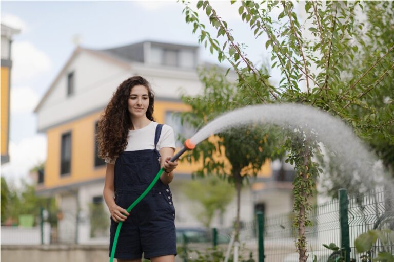 young woman with curly hair wearing overall wateri 2022 09 19 21 53 47 utc