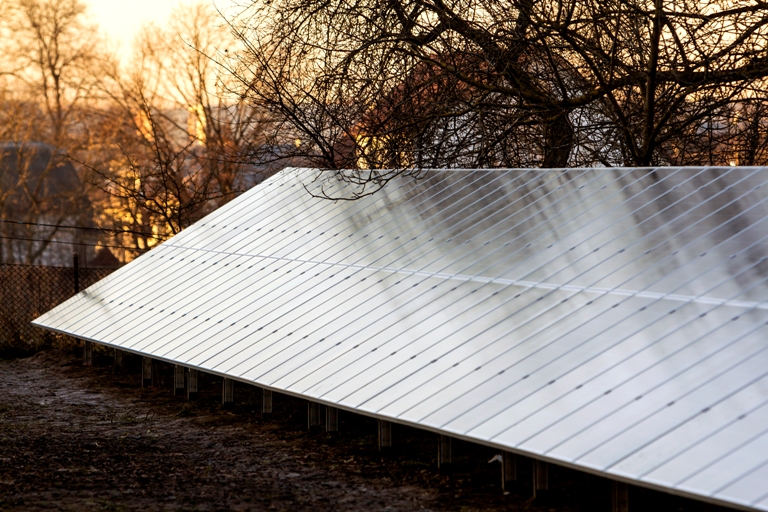 row of solar electric panels for producing electricity